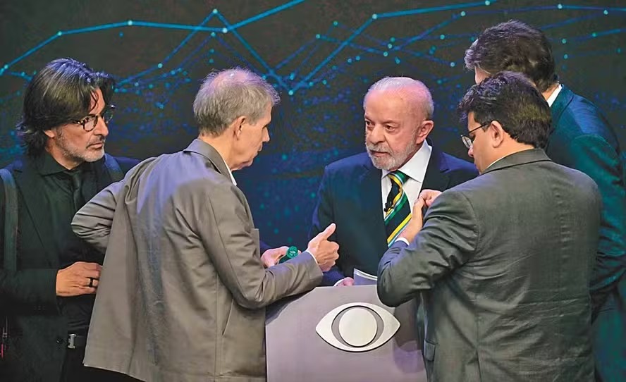 Da irrita��o de Sid�nio com Fl�vio � camisa 'eu prendi o Lula' de Deltan: os detalhes do debate da Band que voc� n�o viu